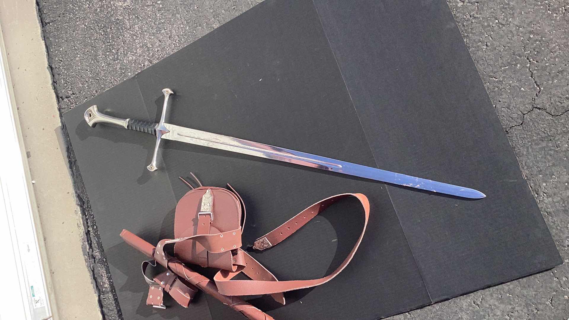 Photo 2 of METAL SWORD 47” LONG WITH LEATHER ACCESSORIES