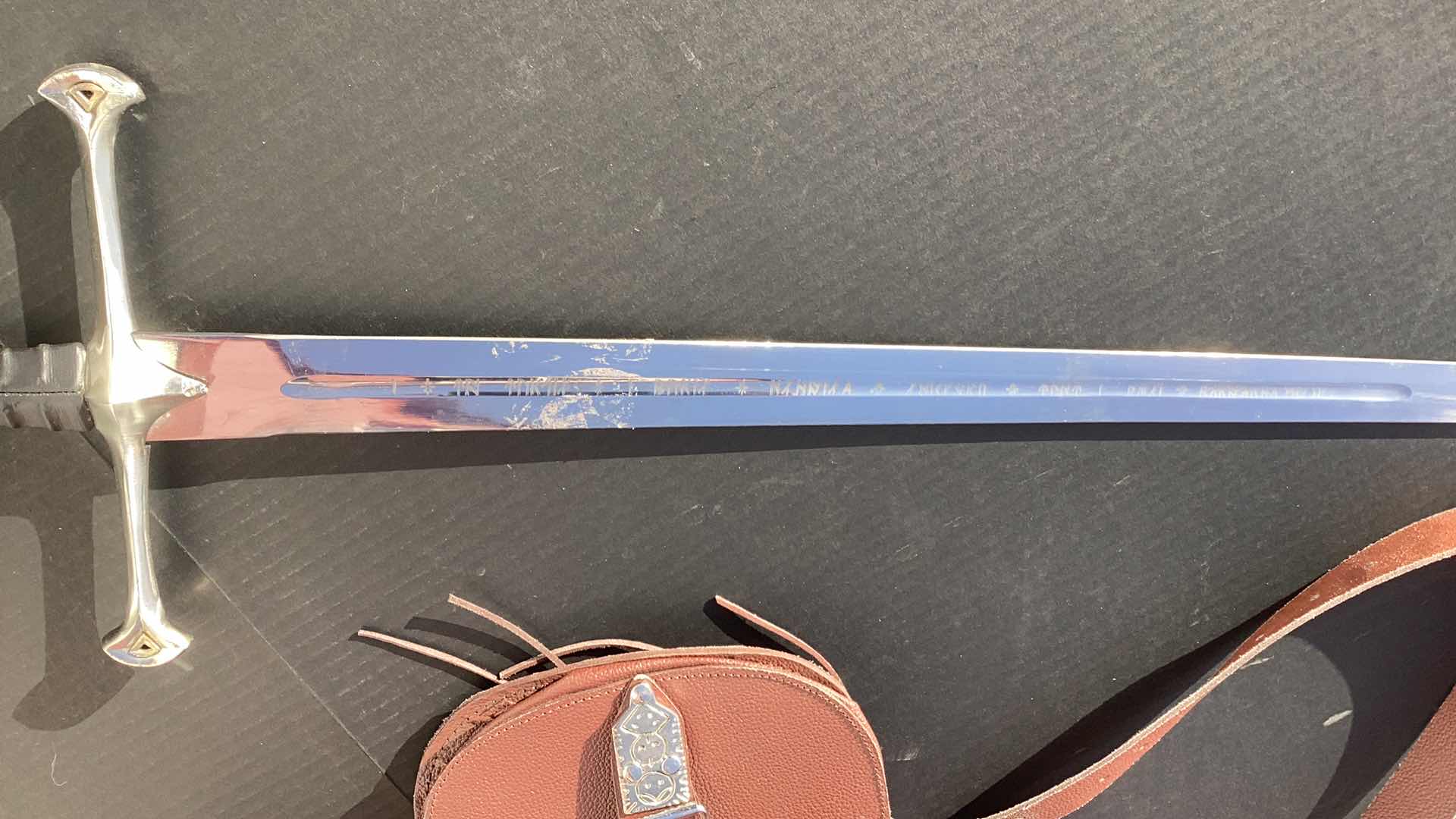 Photo 4 of METAL SWORD 47” LONG WITH LEATHER ACCESSORIES