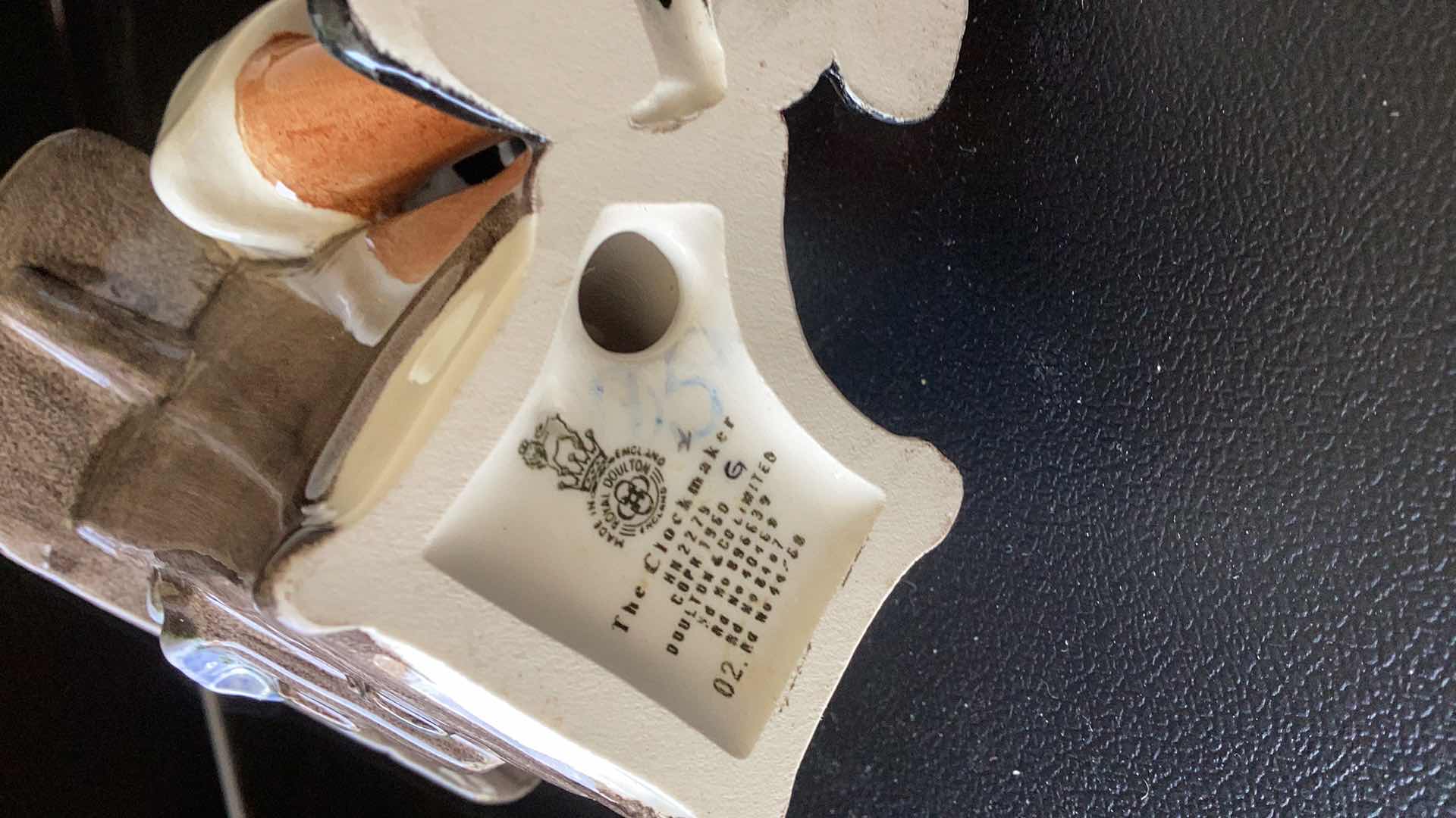 Photo 1 of ROYAL DOULTON “THE CLOCKMAKER” 7” TALL