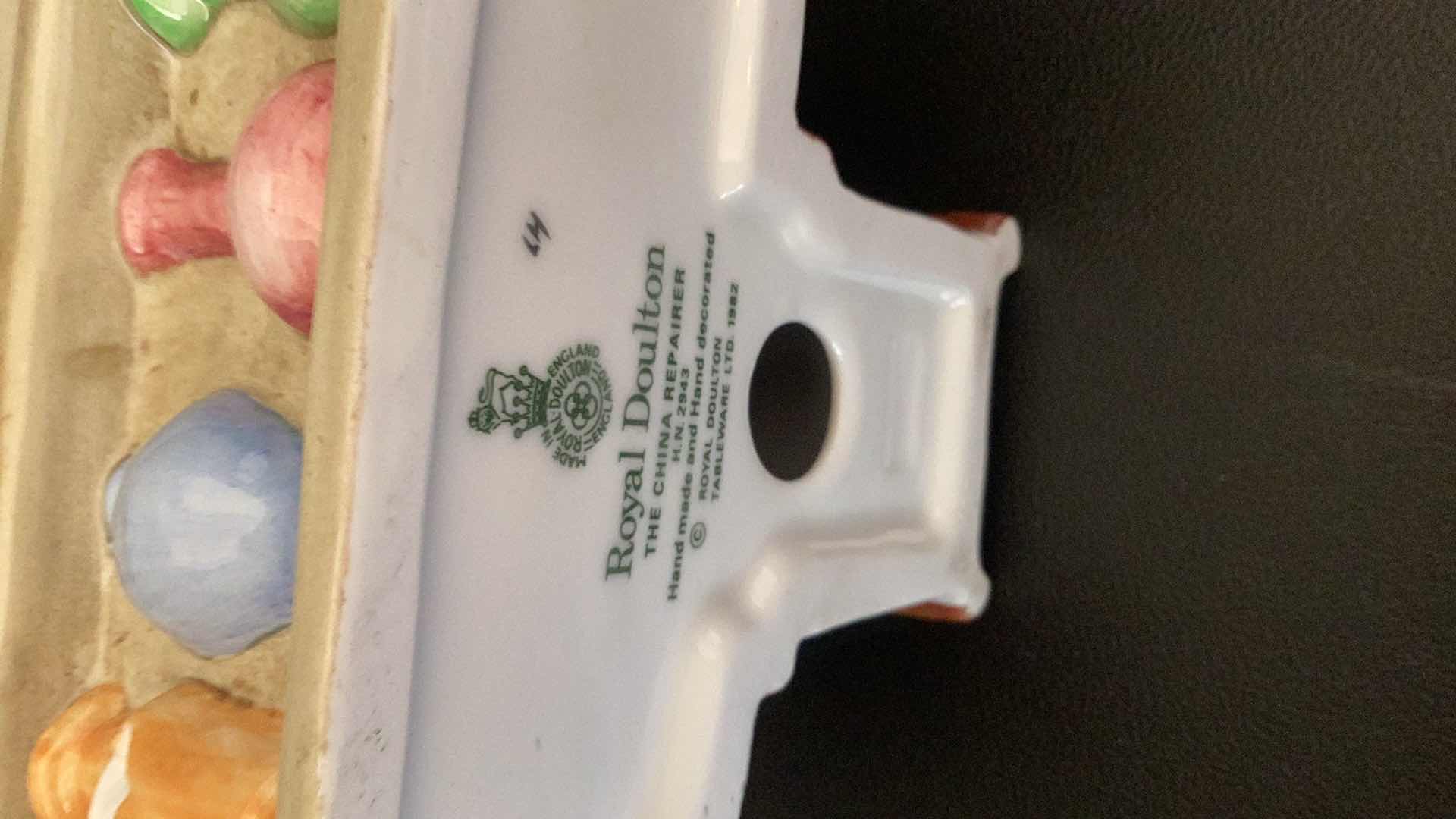 Photo 1 of ROYAL DOULTON “THE CHINA REPAIRER” 7” TALL