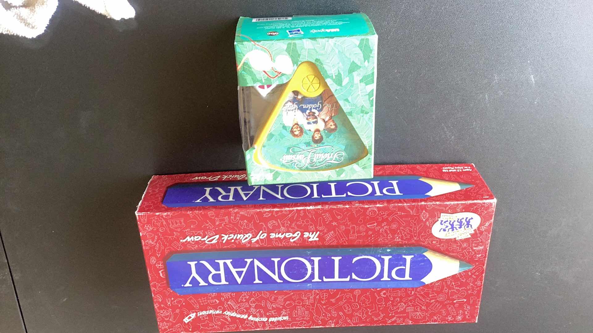 Photo 1 of PICTIONARY AND TRIVIAL PURSUIT GAMES