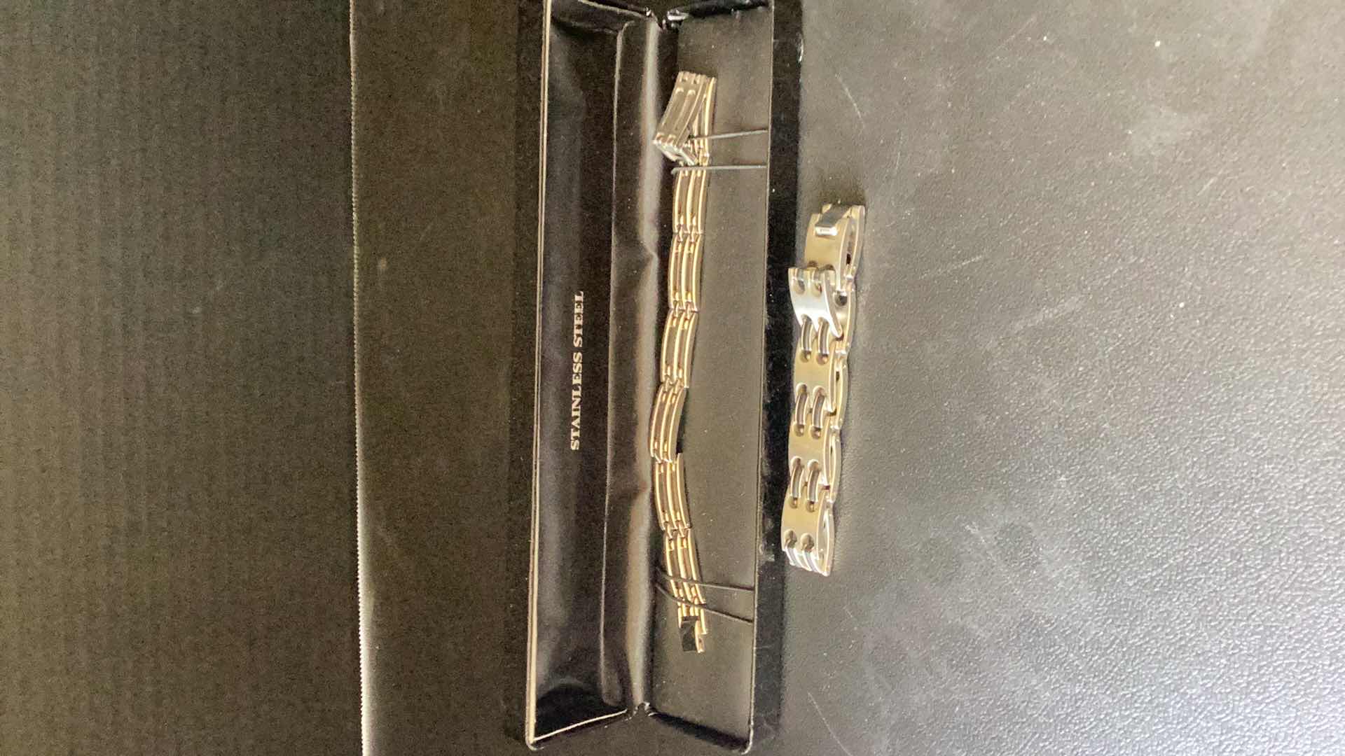 Photo 1 of TWO MENS STAINLESS STEEL BRACELETS