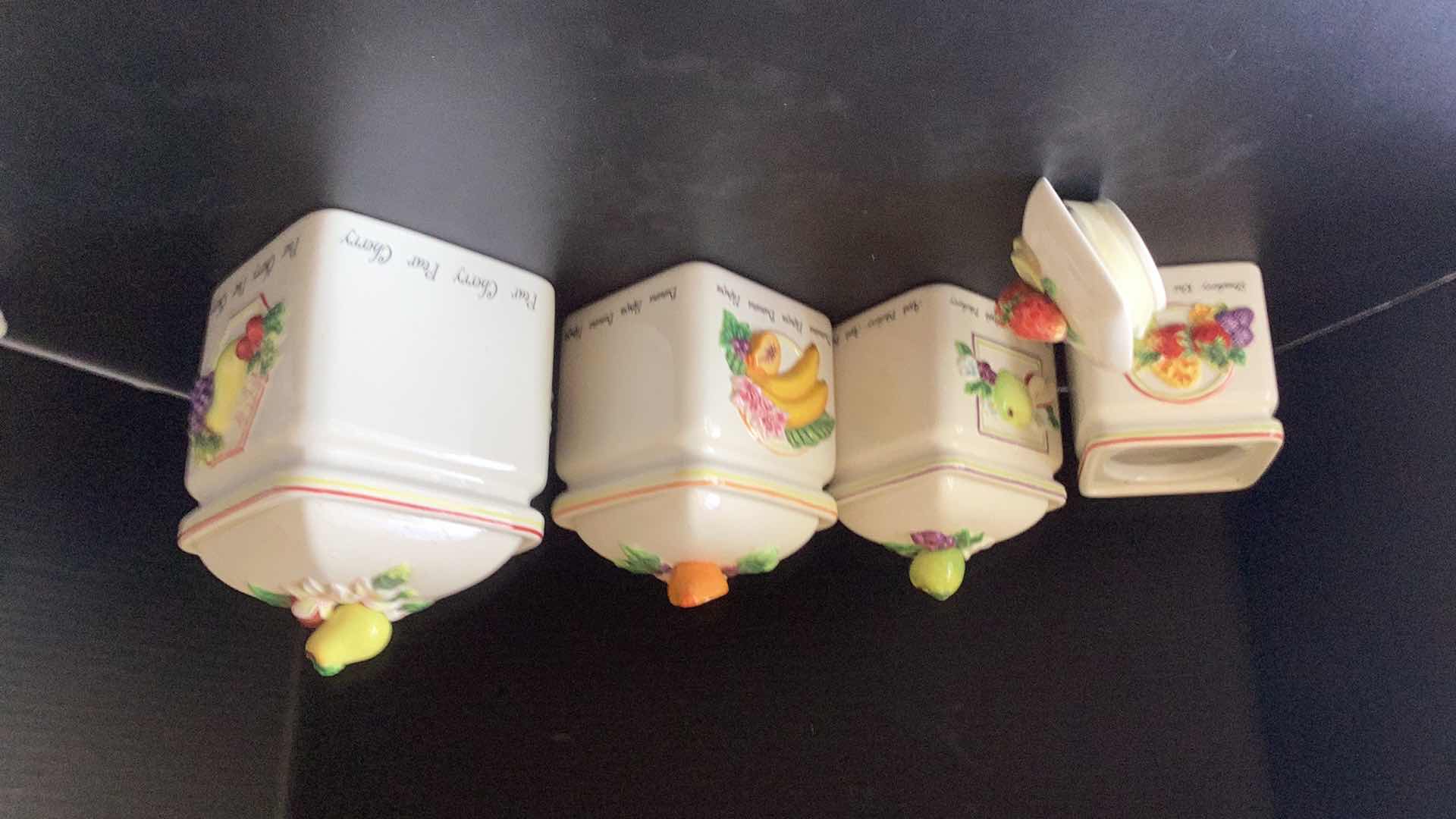 Photo 1 of SET OF FOUR KITCHEN DECANTERS