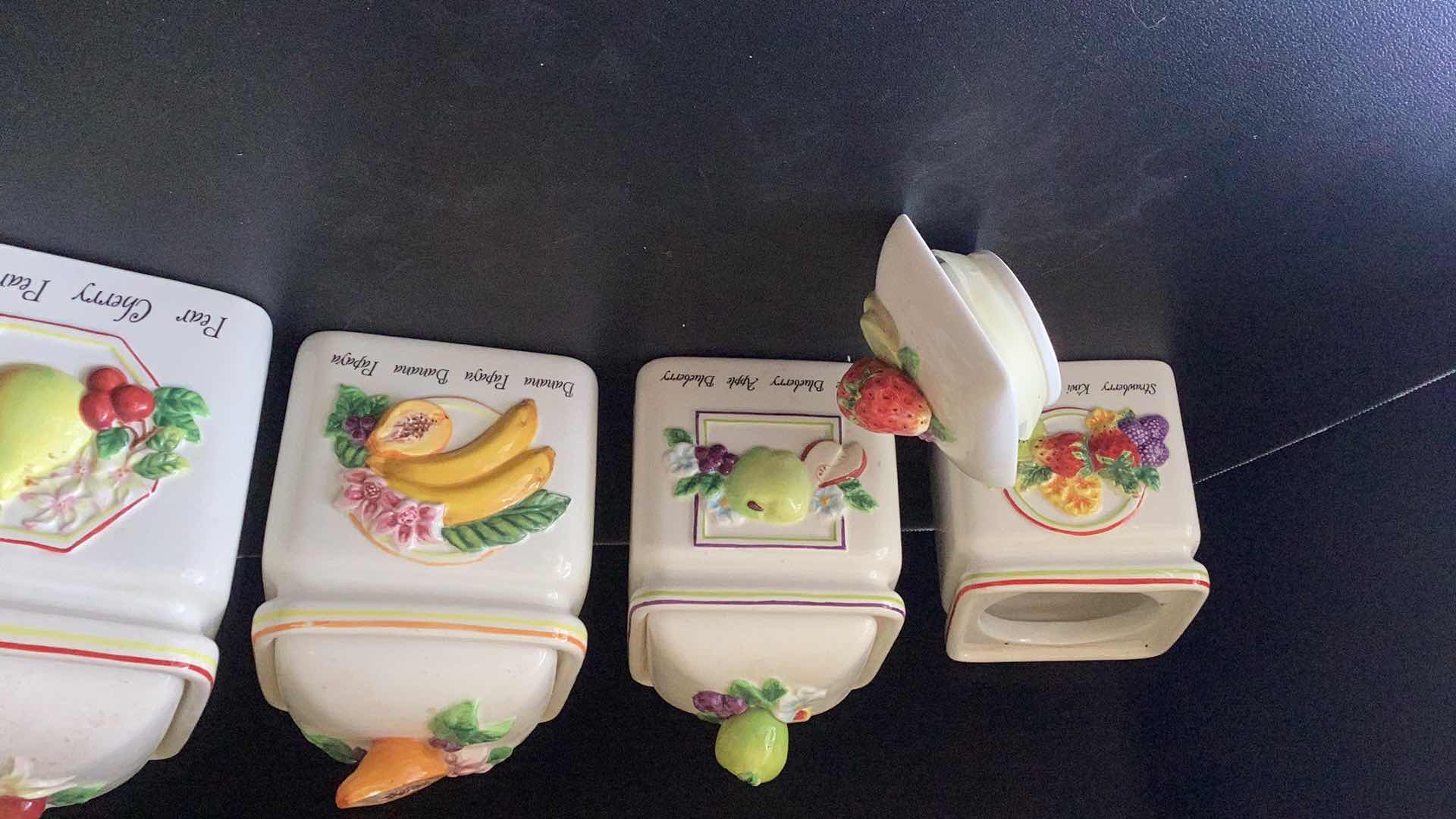 Photo 1 of SET OF FOUR KITCHEN DECANTERS