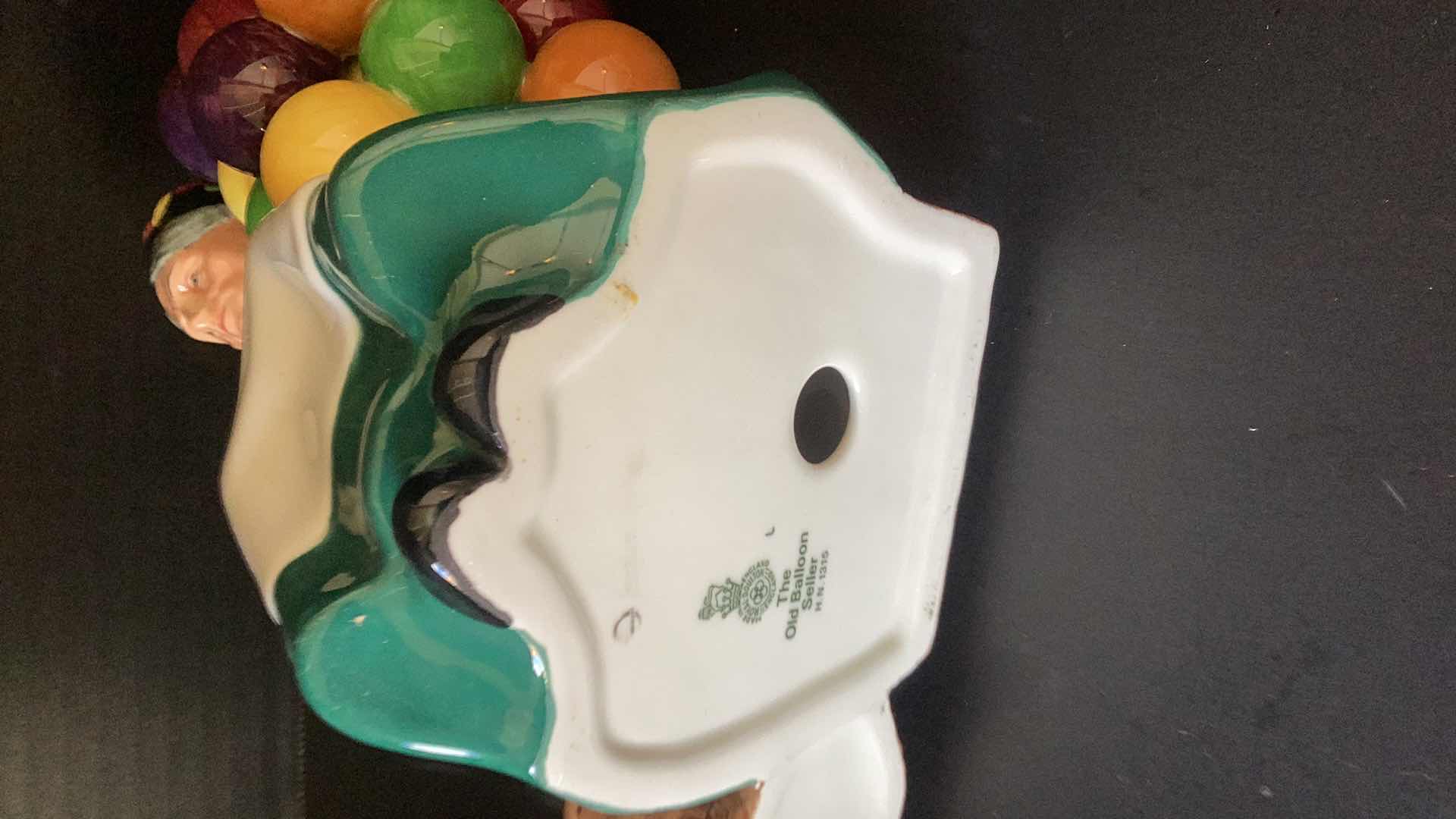 Photo 1 of ROYAL DOULTON “THE OLD BALOON SELLER” 7 1/2” TALL 