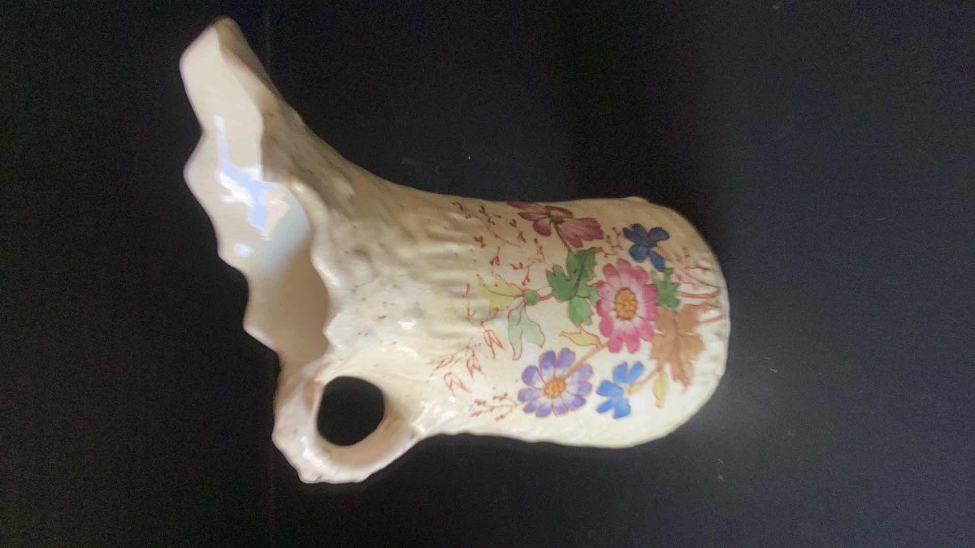 Photo 1 of ANTIQUE CREAMER WITH FLORAL PATTERN 6” TALL 