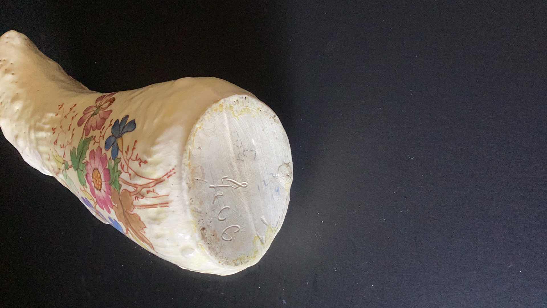 Photo 1 of ANTIQUE CREAMER WITH FLORAL PATTERN 6” TALL 