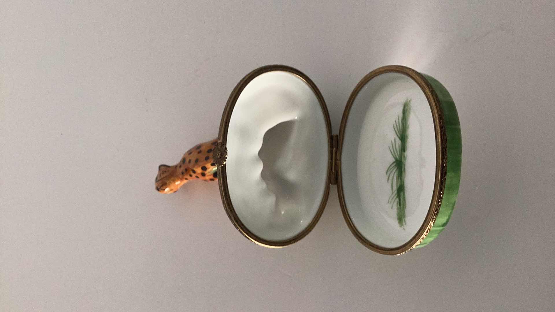 Photo 1 of LIMOGES FRANCE PORCELAIN CHEETAH WITH CUB PILL BOX 3” X 3” 