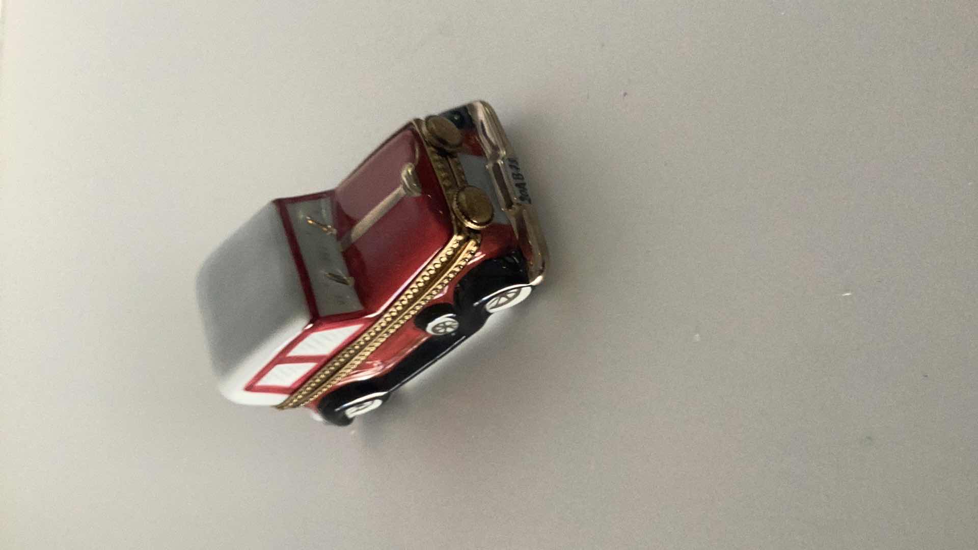 Photo 1 of LIMOGES FRANCE PORCELAIN ROADSTER 3” LONG $300