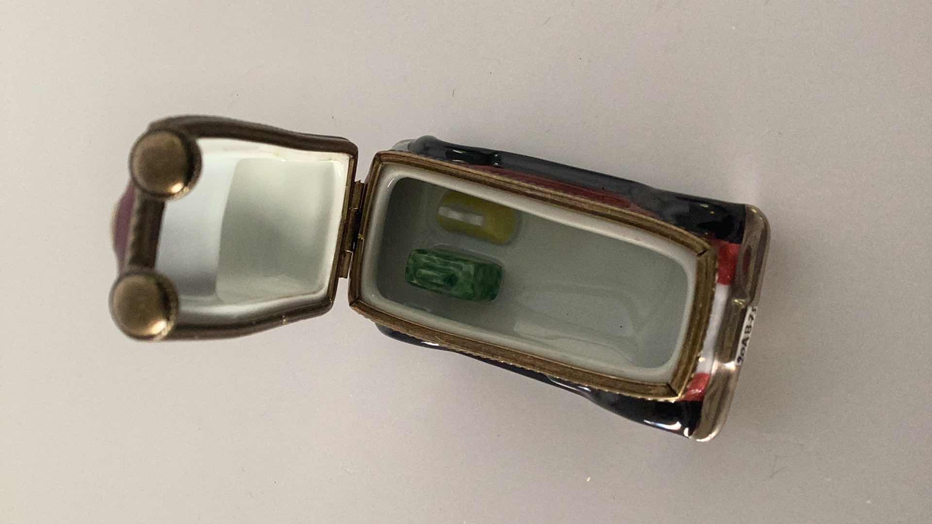 Photo 1 of LIMOGES FRANCE PORCELAIN ROADSTER 3” LONG $300