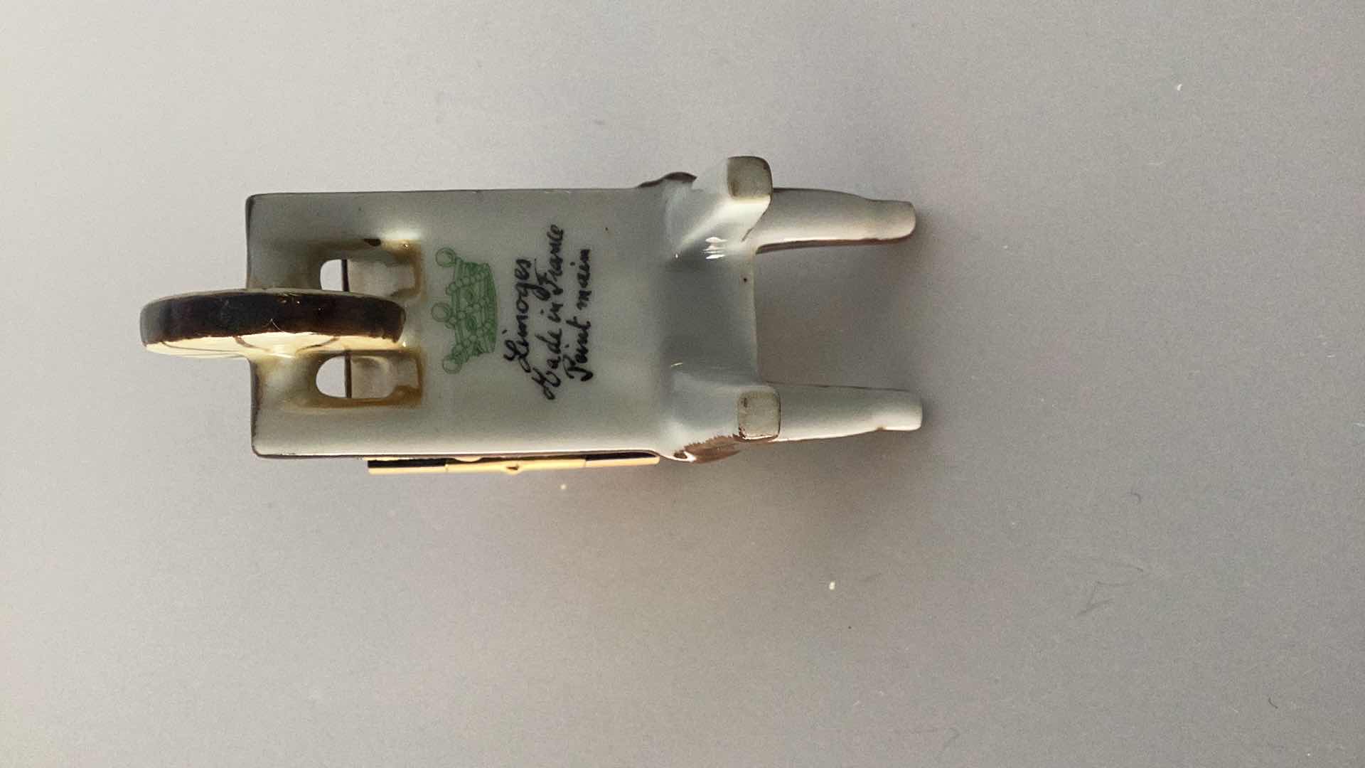 Photo 1 of LIMOGES FRANCE WHEELBARROW WITH VEGETABLES 3 1/2” LONG 