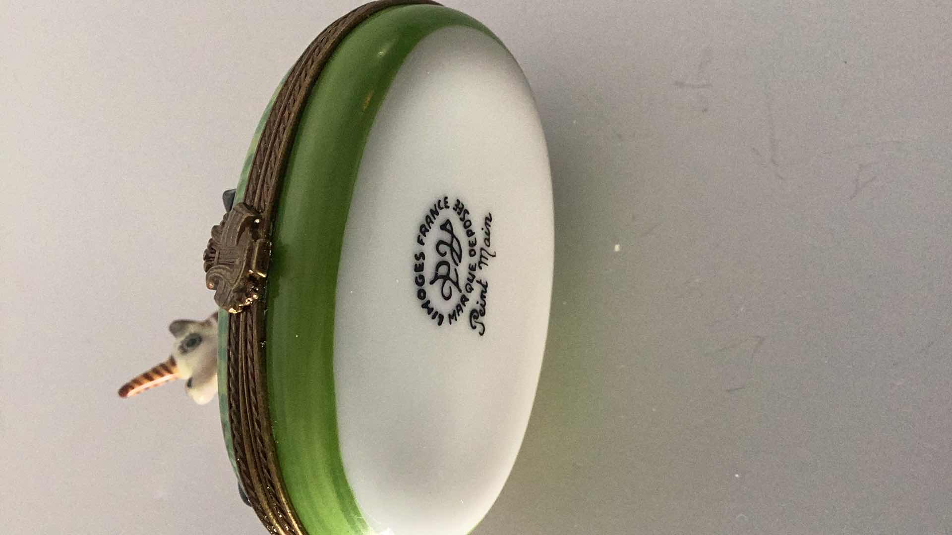 Photo 1 of LIMOGES FRANCE UNICORN PILL BOX 2 1/2” LONG 