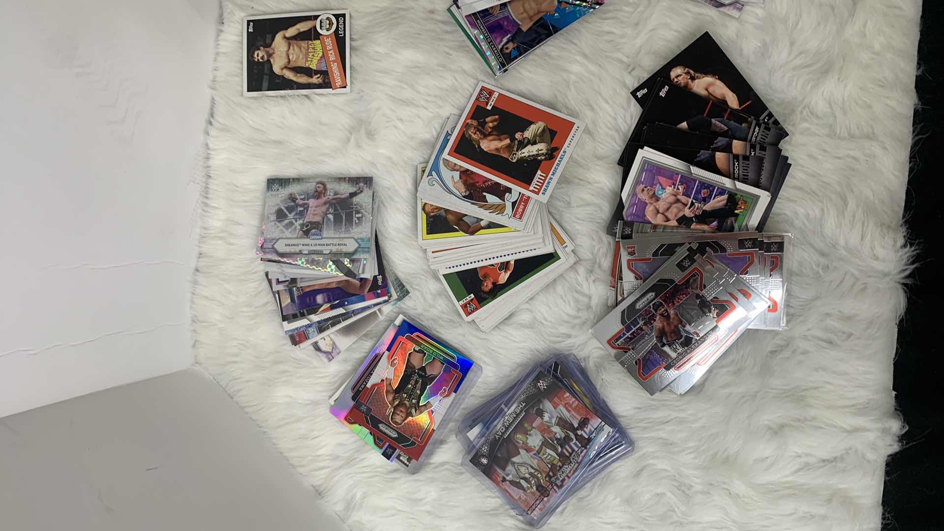 Photo 1 of STACK OF COLLECTIBLE WRESTLING CARDS AND TIN