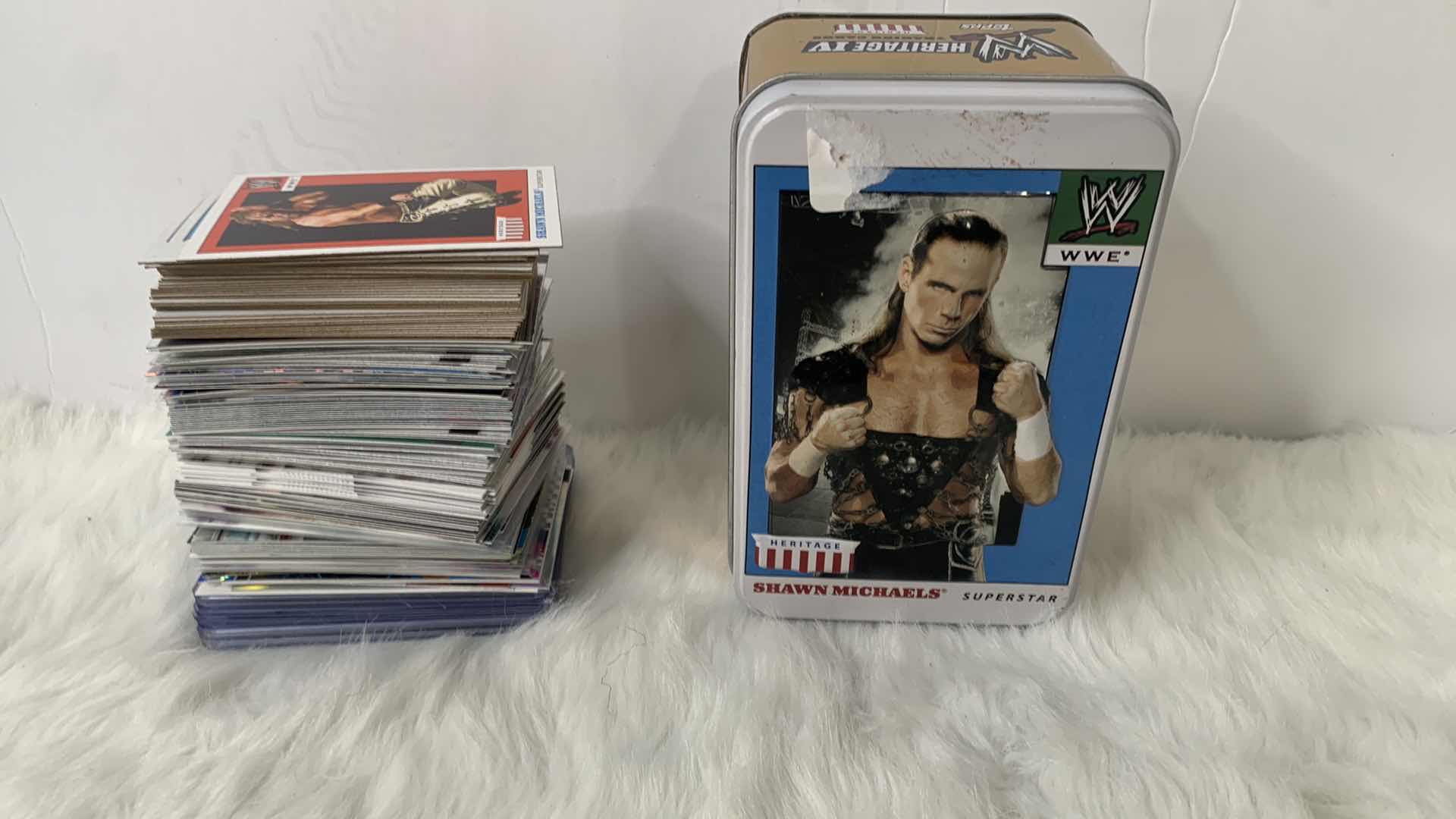 Photo 1 of STACK OF COLLECTIBLE WRESTLING CARDS AND TIN