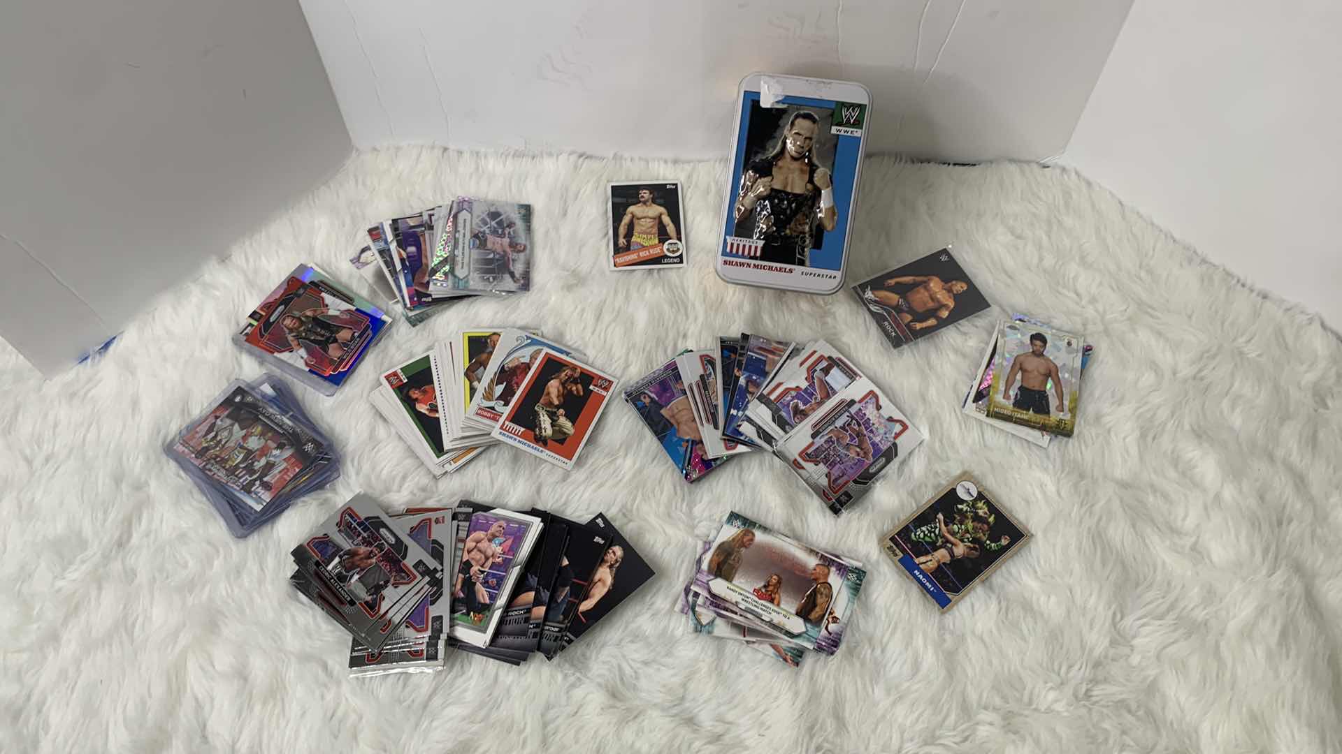 Photo 1 of STACK OF COLLECTIBLE WRESTLING CARDS AND TIN