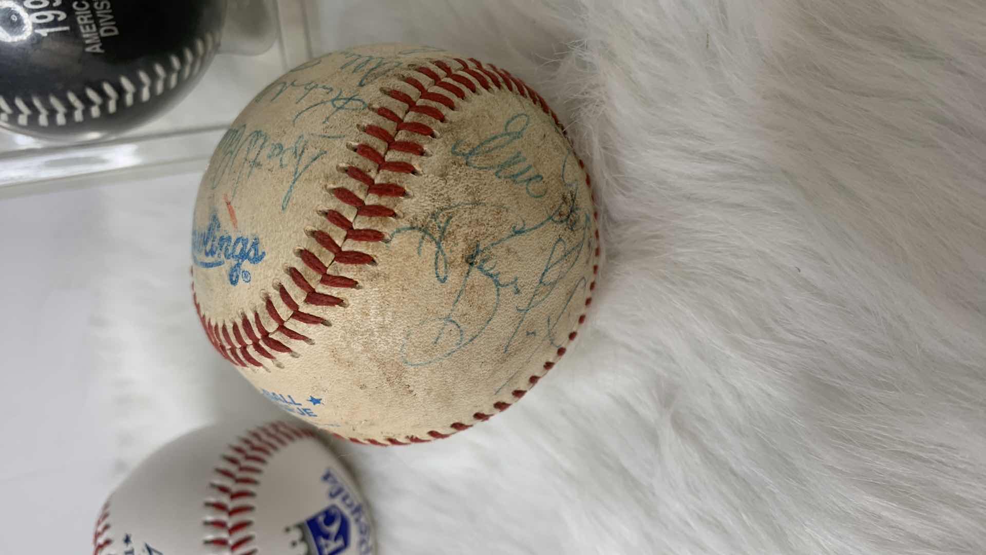 Photo 1 of BASEBALL COLLECTIBLES, 4 BASEBALLS AND ROY HOBBS CARD