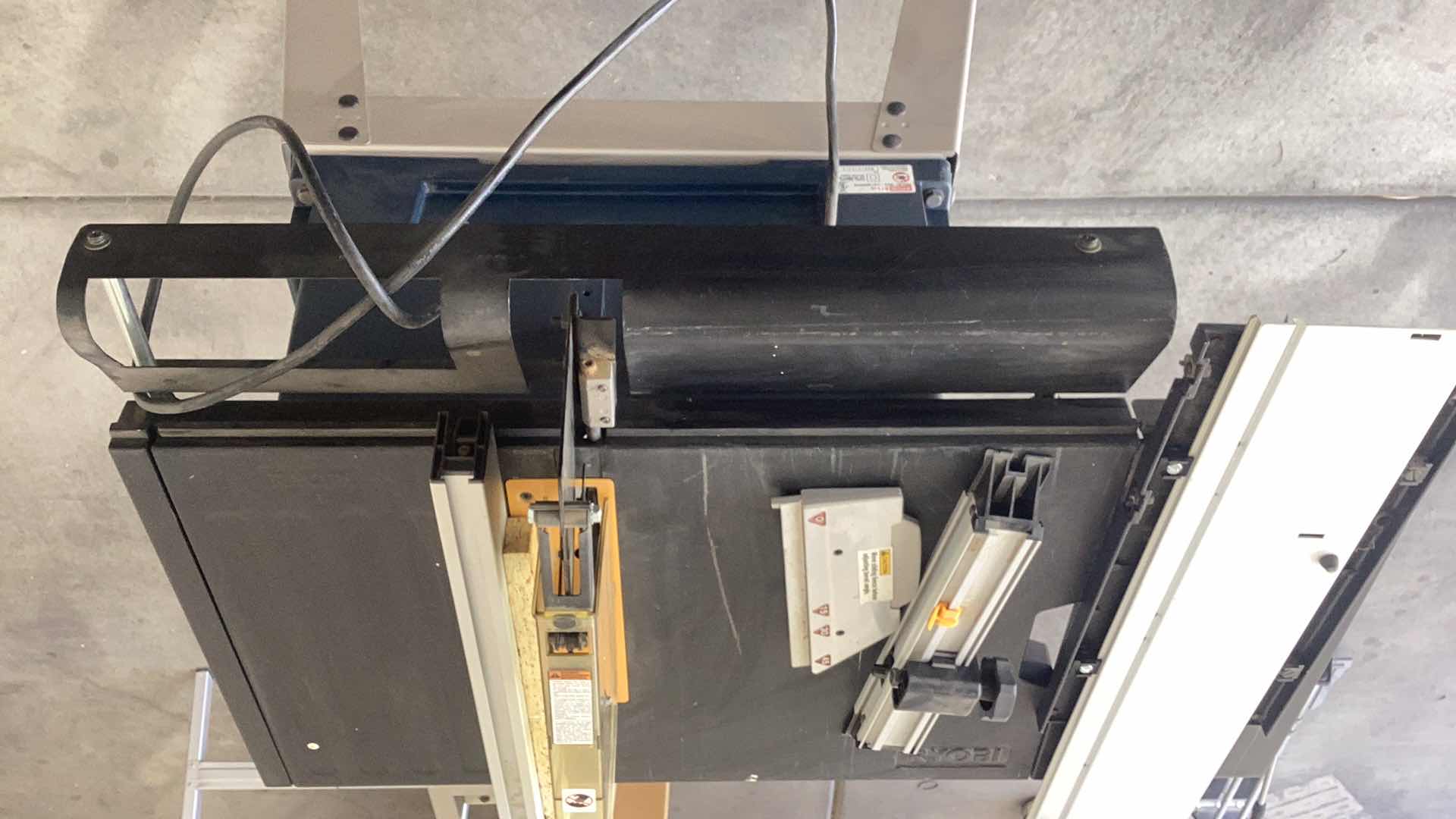 Photo 1 of RYOBI 10” PORTABLE TABLE SAW WITH STAND