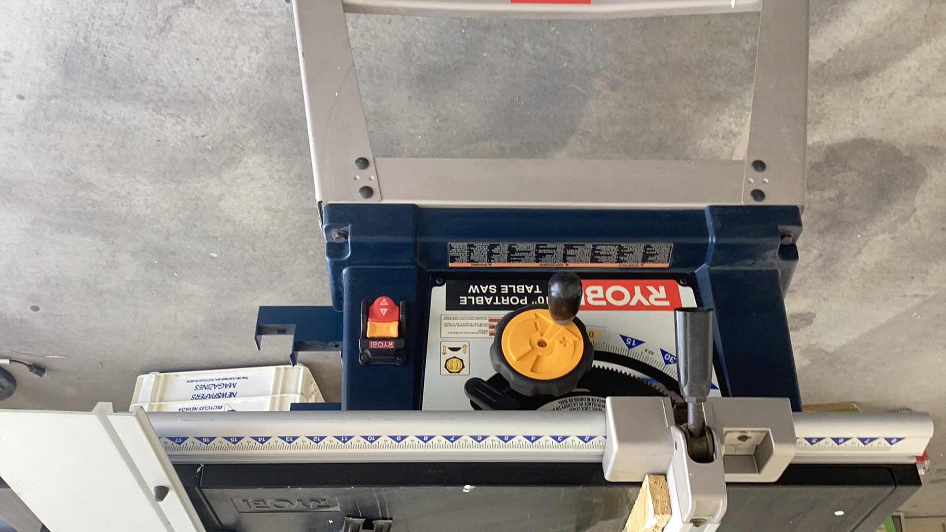 Photo 1 of RYOBI 10” PORTABLE TABLE SAW WITH STAND