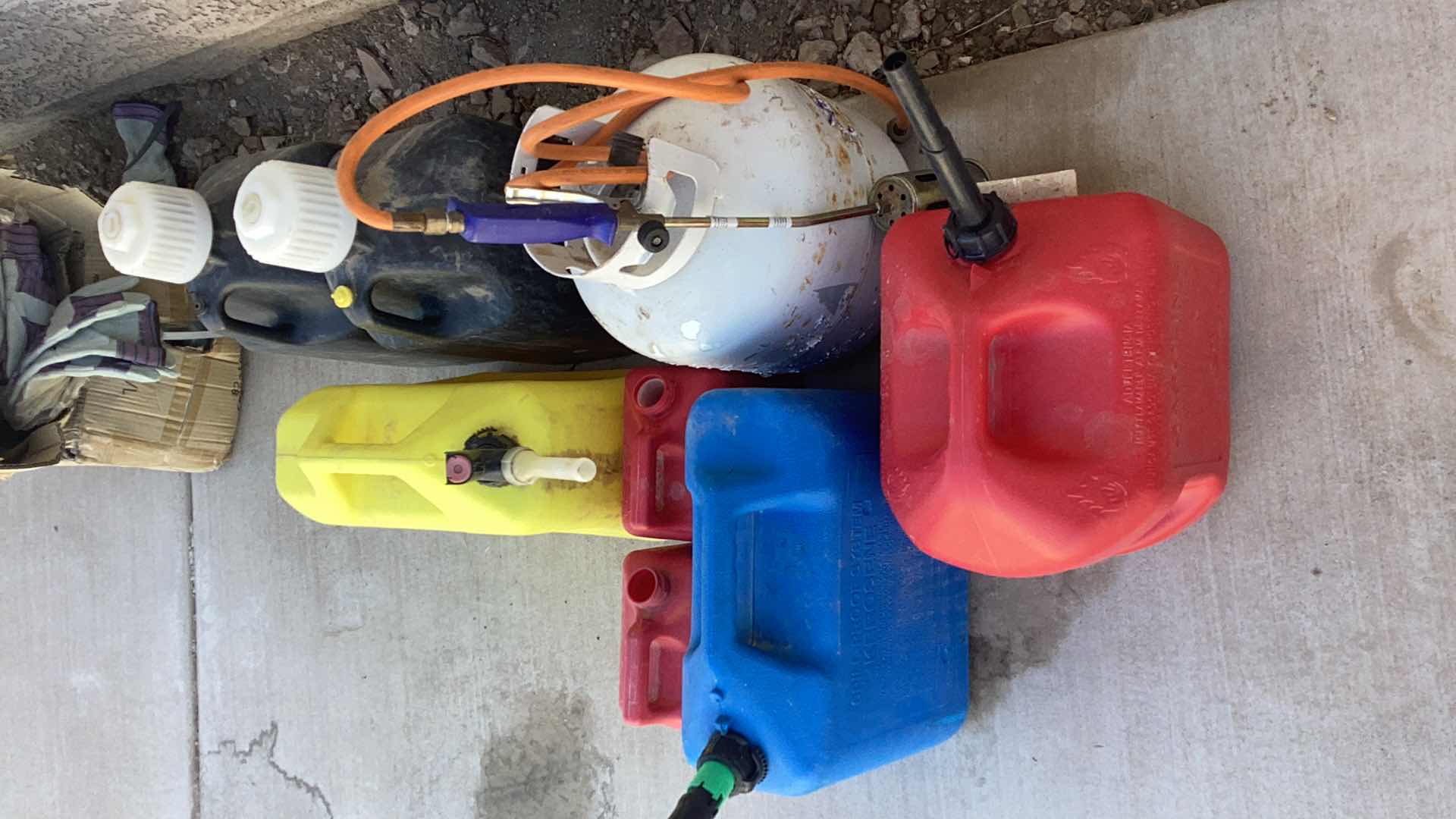 Photo 2 of EMPTY GASOLINE AND PROPANE CONTAINERS