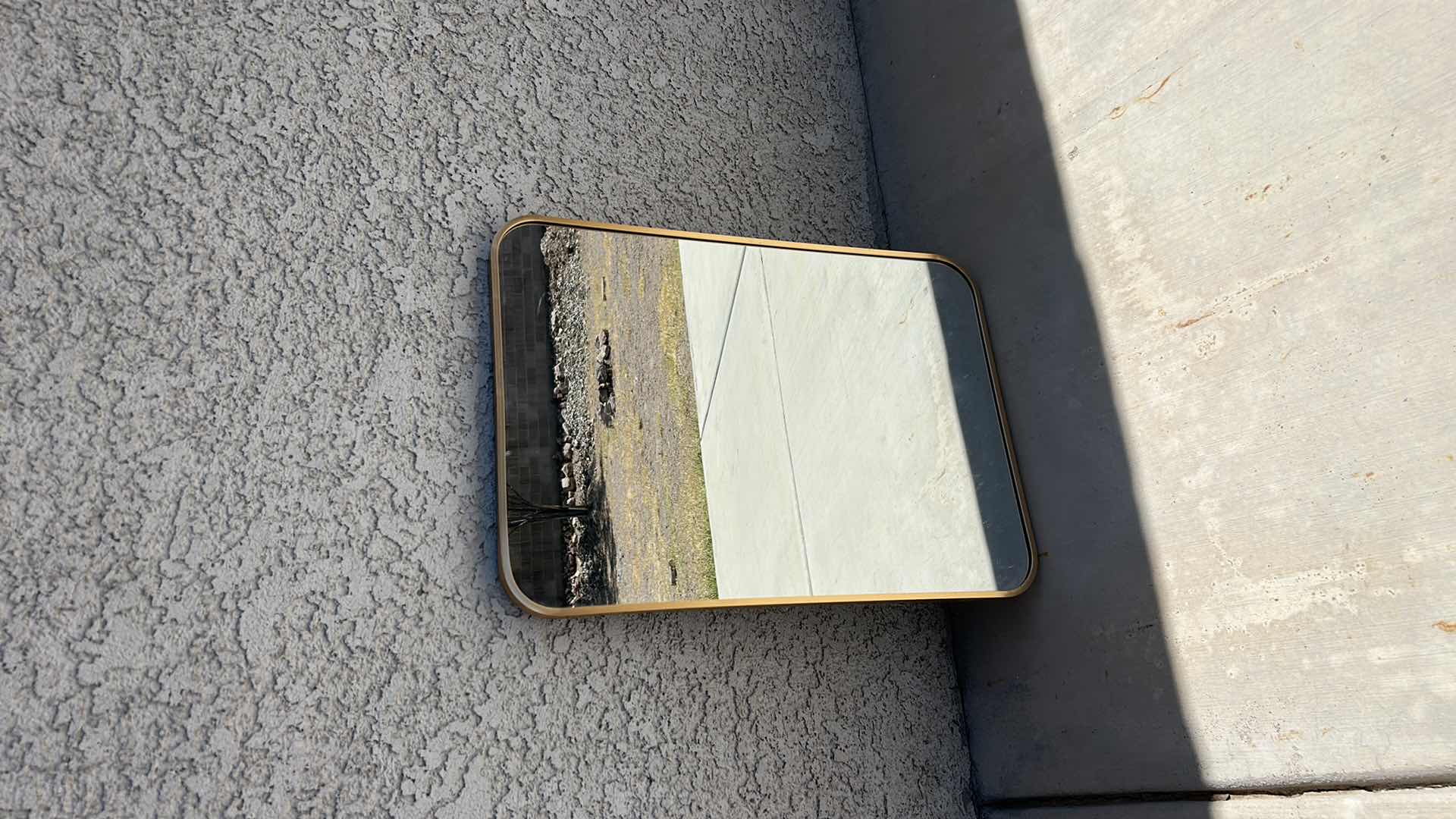 Photo 1 of HOME DECOR - GOLD FRAMED HEAVY METAL MIRROR 20” x 28”