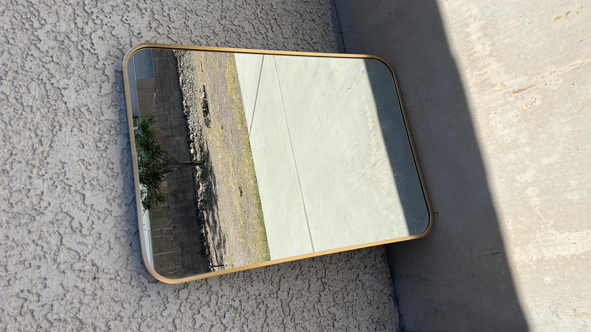 Photo 1 of HOME DECOR - GOLD FRAMED HEAVY METAL MIRROR 20” x 28”