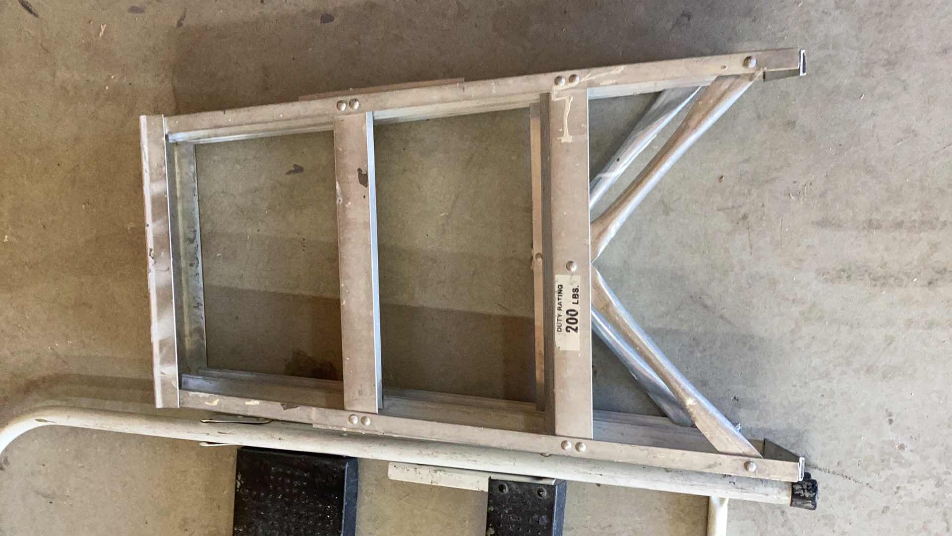 Photo 1 of TWO STEP STOOLS