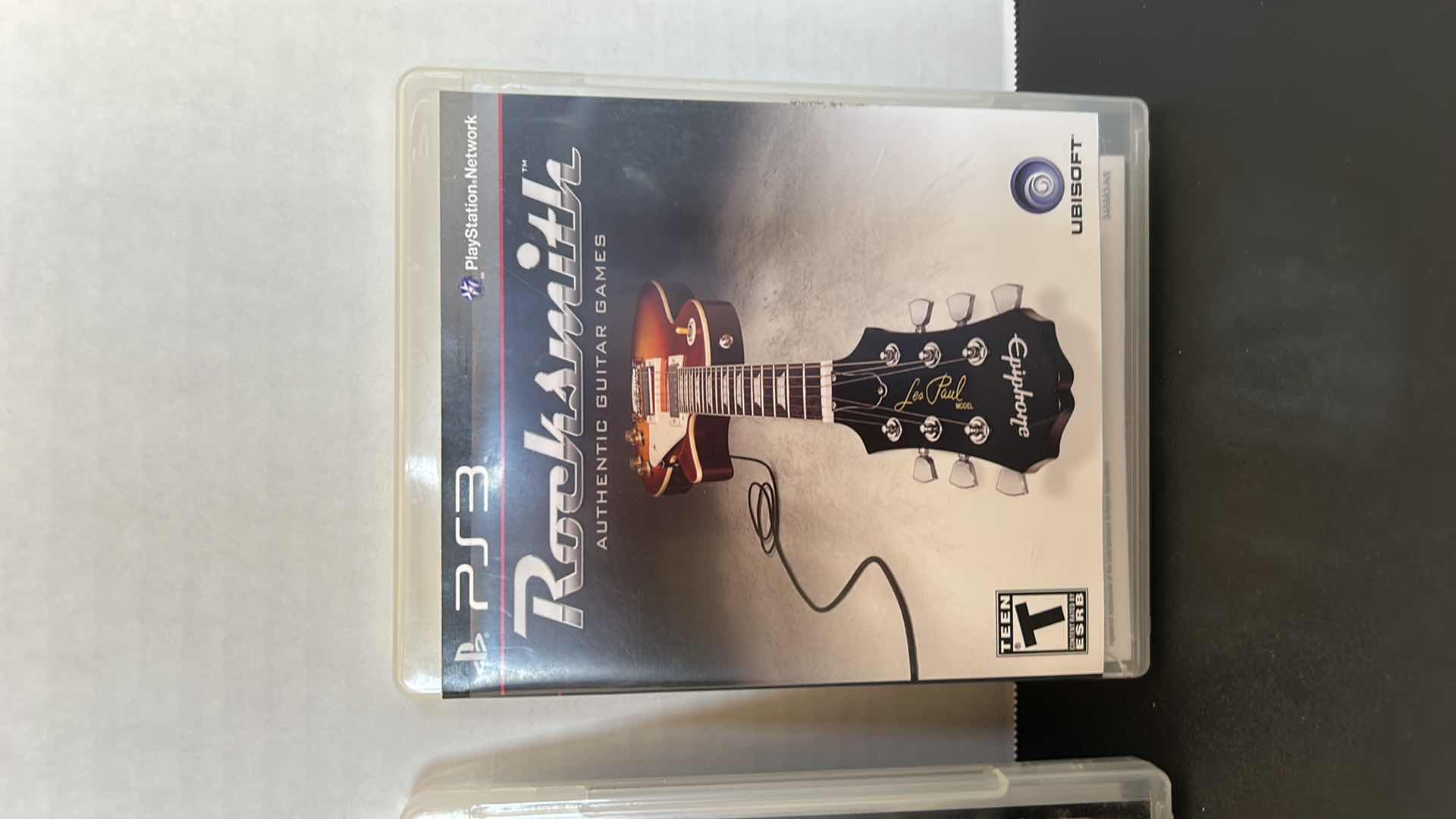 Photo 1 of 3 PS3 GAMES AND 1 CONTROLLER