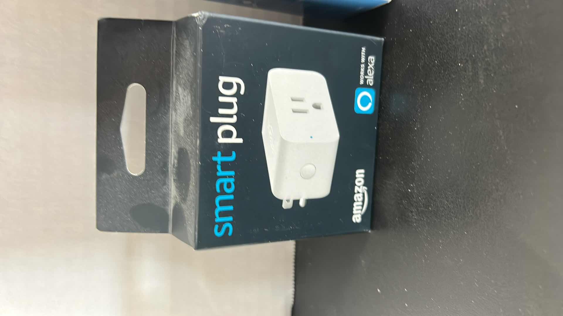 Photo 1 of THREE NEW BOXED ELECTRONICS (SMART PLUG - 2 POWER ADAPTERS