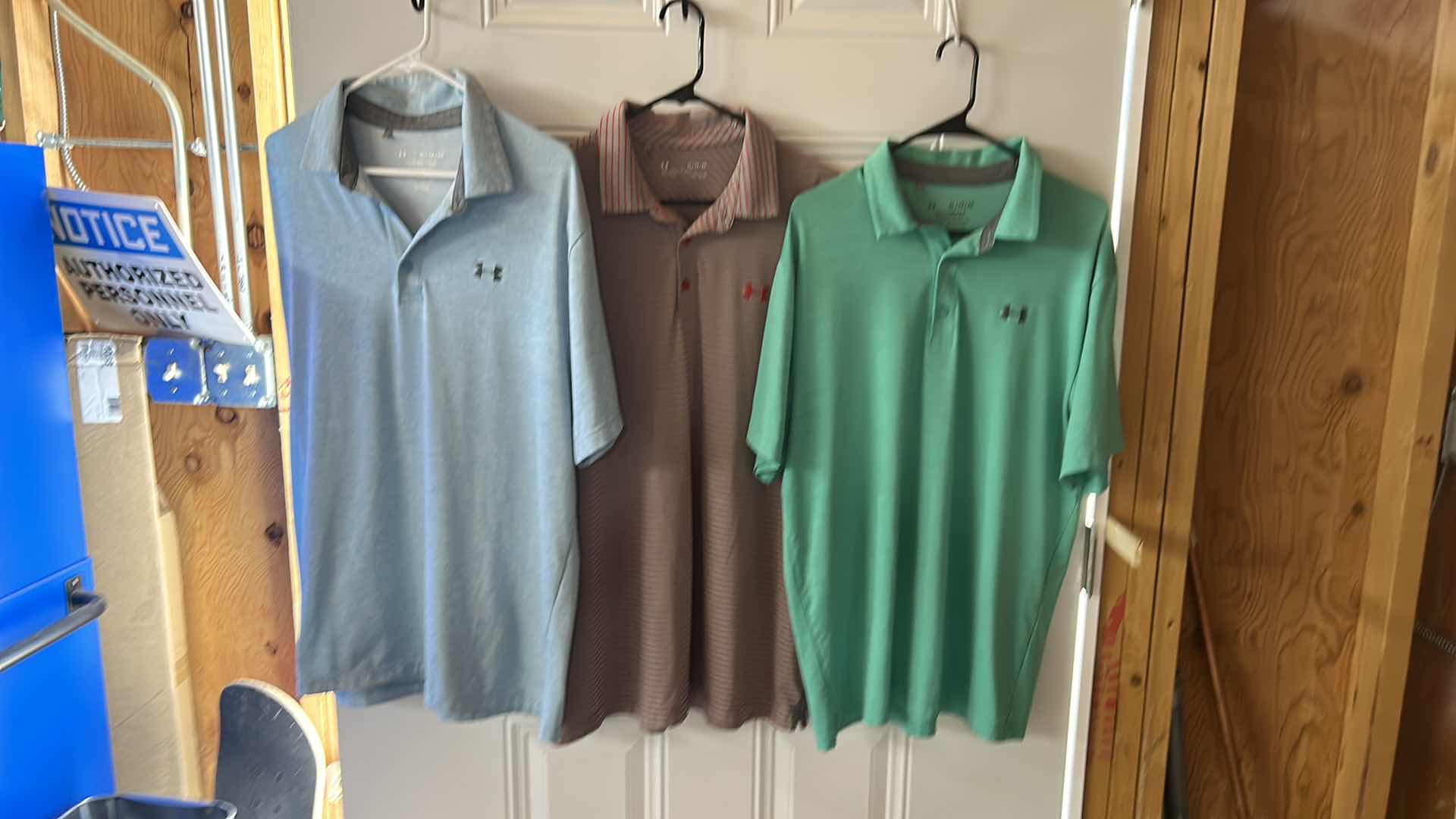 Photo 1 of THREE UNDER ARMOR POLO SHIRTS SIZE XL