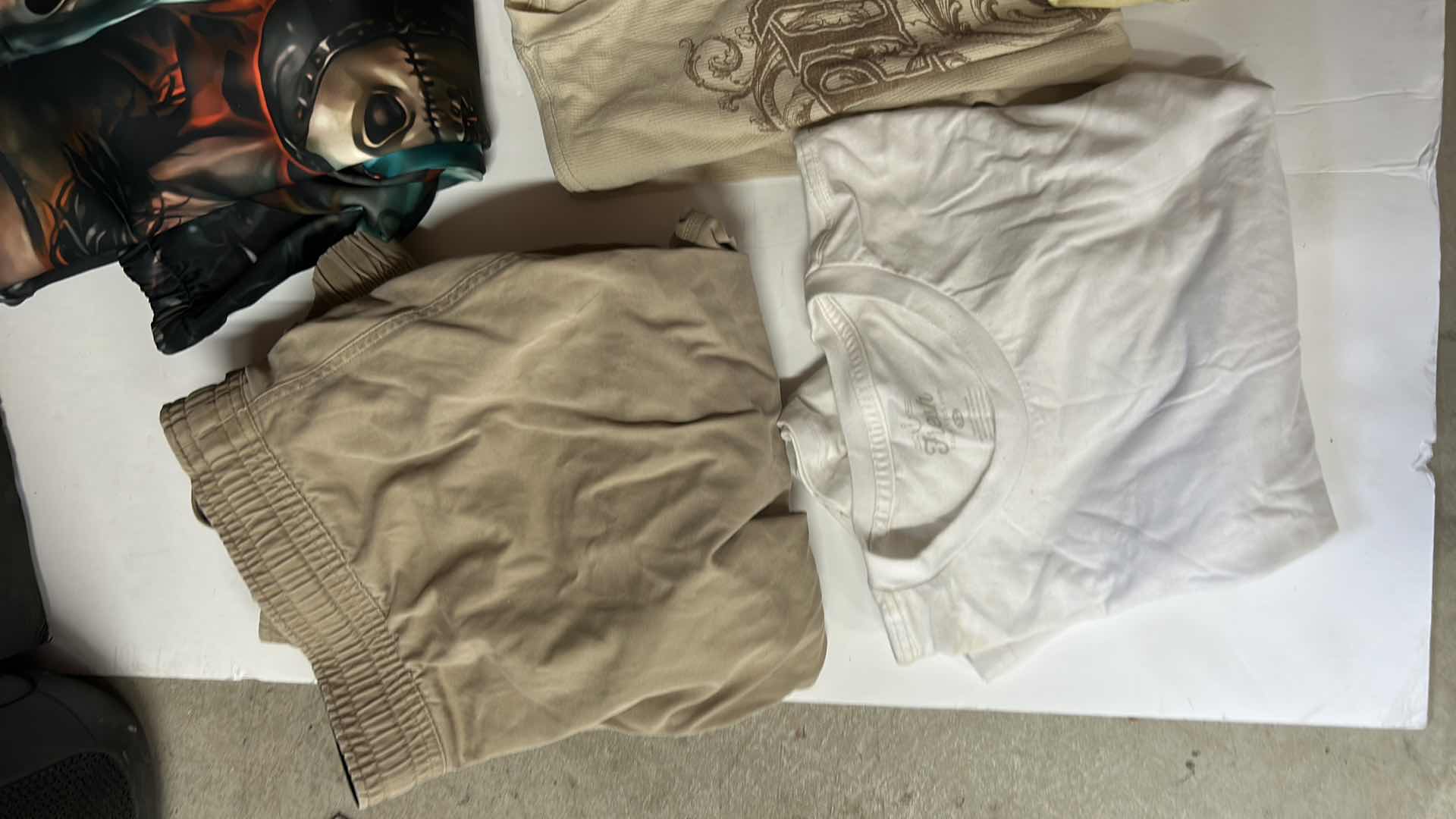 Photo 1 of MENS CLOTHING ASSORTMENT SIZE XL