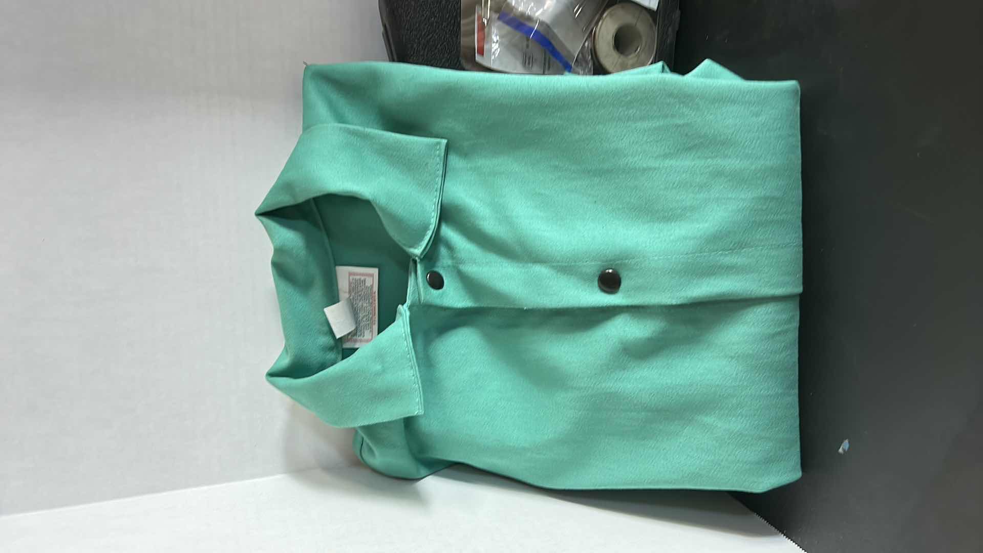 Photo 1 of WELDER JACKET AND WELLER SOLDER GUN