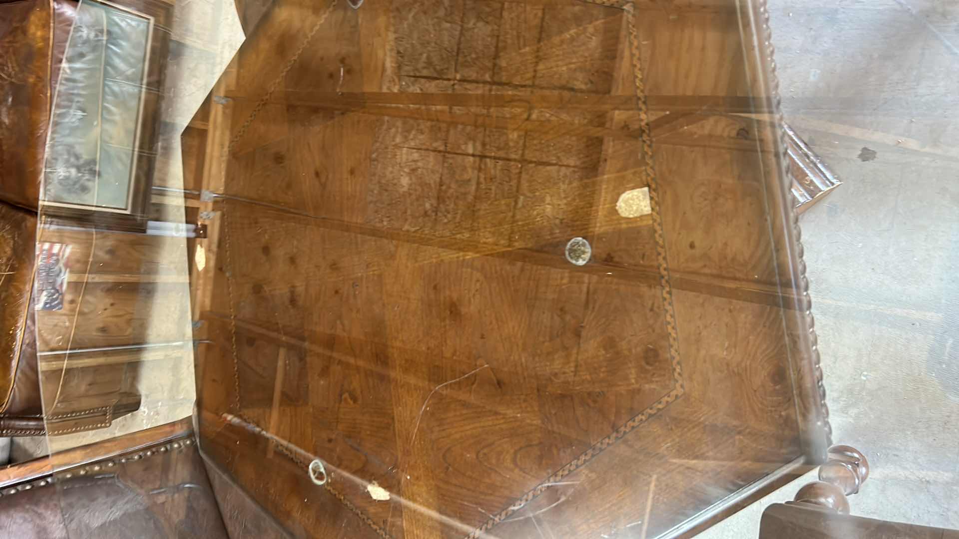 Photo 1 of WOOD GLASS TOP ROUND PEDESTAL TABLE W FOUR LEATHER AND WOOD CHAIRS 5’ x H 30”