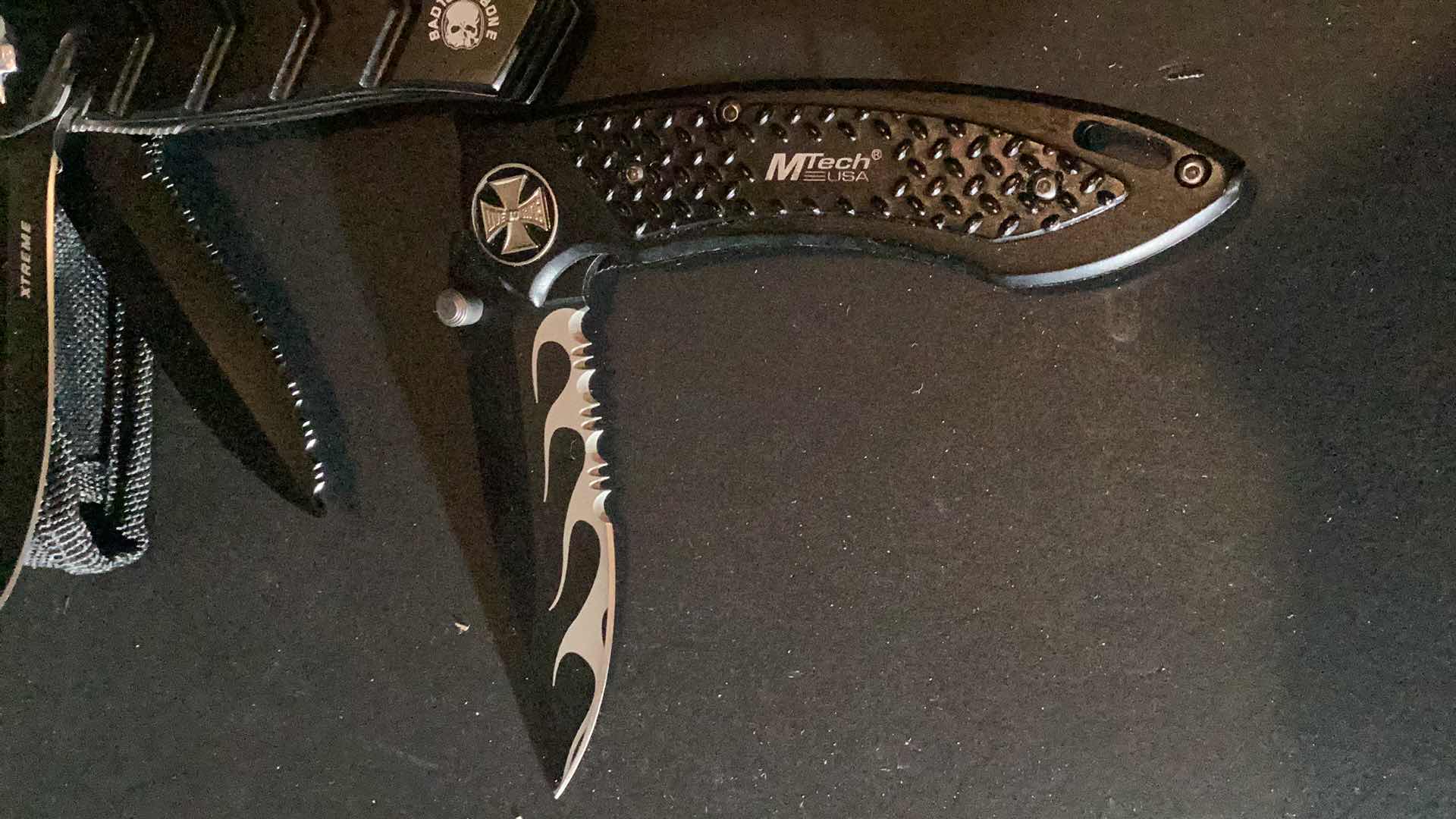 Photo 1 of DEFENDER EXTREME, AND MTECH KNIVES