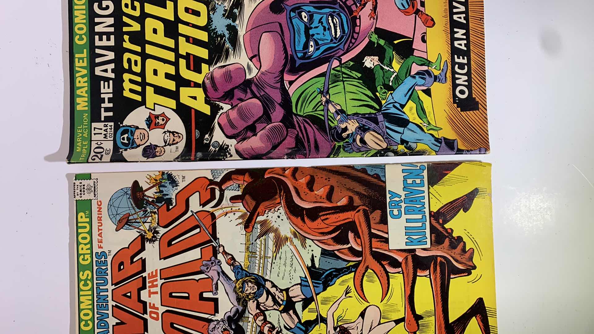 Photo 1 of MARVEL 1973 AND 1976 KA-ZAR, WAR OF THE WORLDS, AND THE AVENGERS COMICS