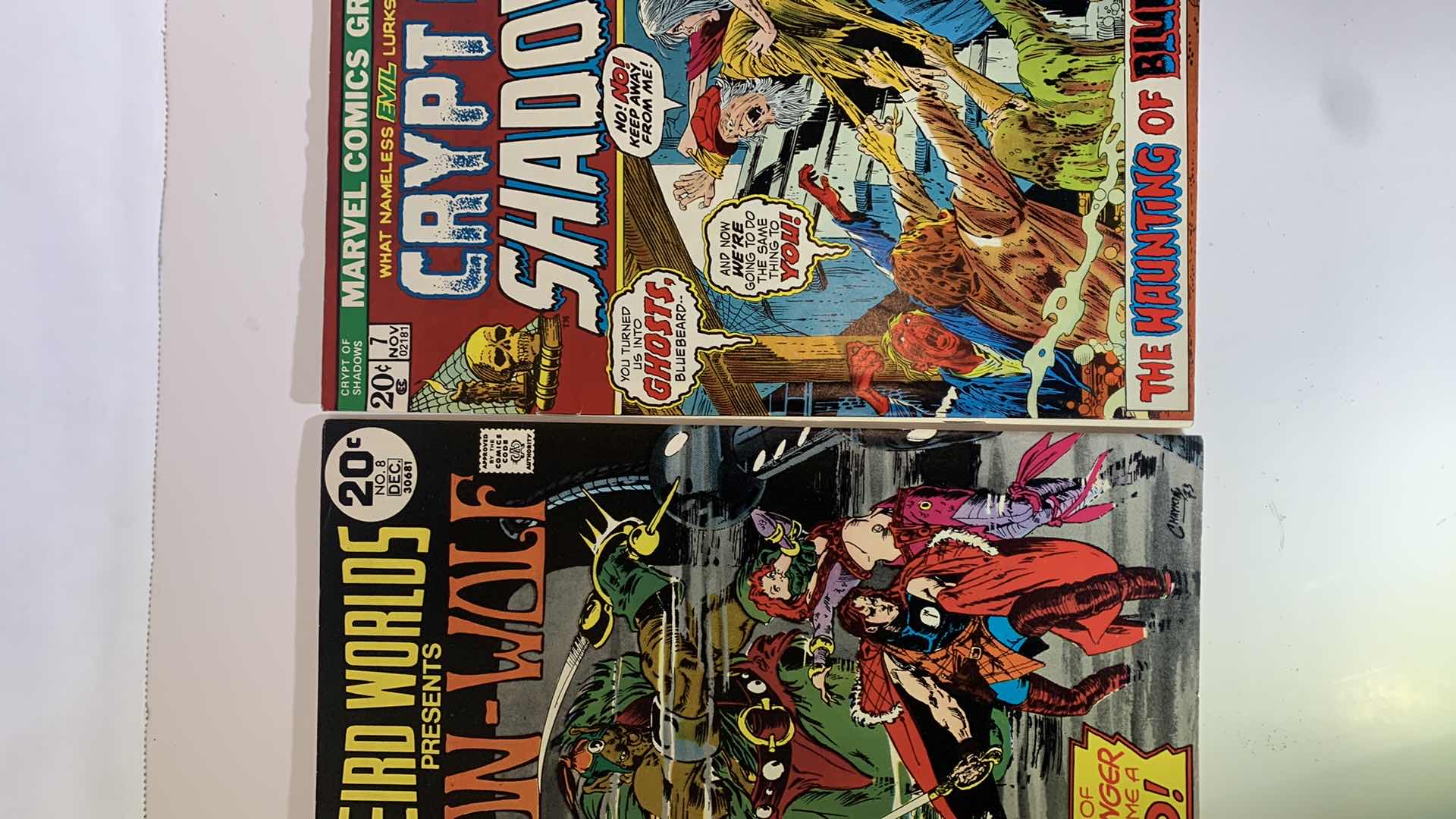 Photo 1 of DC AND MARVEL 1973 AND 1975 IRON-WOLF, CRYPT OF SHADOWS, AND WEIRD WONDER TALES COMICS