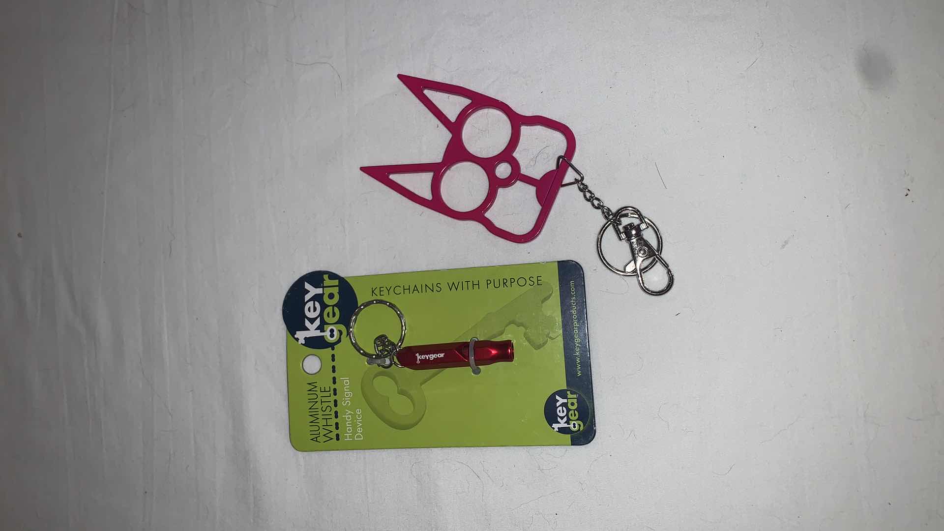 Photo 1 of KEYCHAIN PROTECTION SET WITH WHISTLE AND CAT EYES MELEE