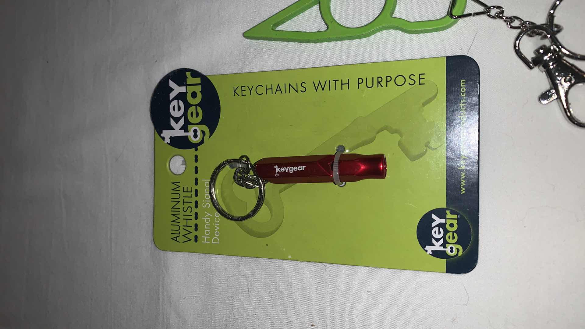 Photo 1 of KEYCHAIN PROTECTION SET WITH WHISTLE AND CAT EYES MELEE