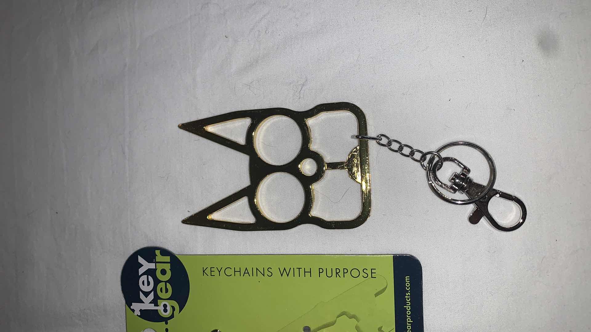 Photo 3 of KEYCHAIN PROTECTION SET WITH WHISTLE AND CAT EYES MELEE