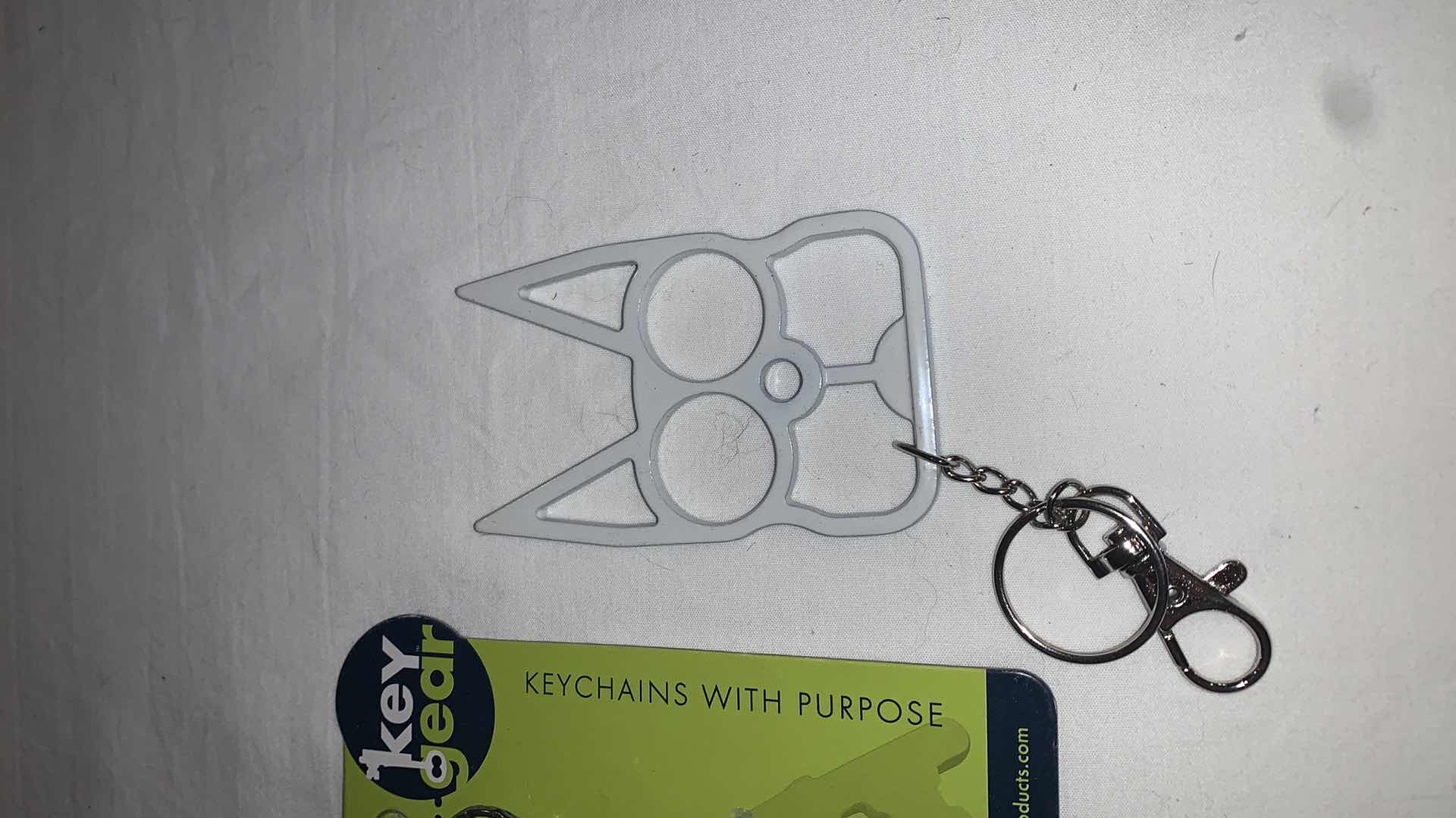 Photo 1 of KEYCHAIN PROTECTION SET WITH WHISTLE AND CAT EYES MELEE