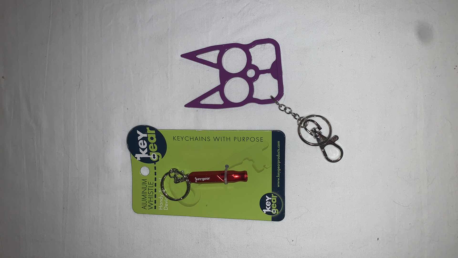Photo 1 of KEYCHAIN PROTECTION SET WITH WHISTLE AND CAT EYES MELEE