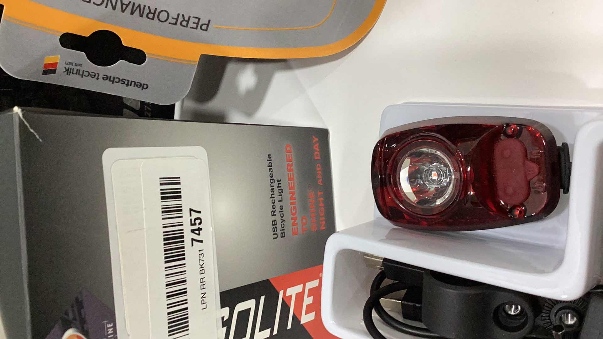 Photo 1 of BICYCLE TIRE AND LIGHT