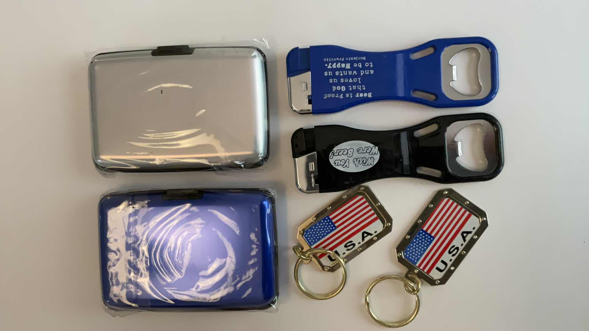 Photo 1 of CARD HOLDERS, KEYCHAINS AND BOTTLE OPENER/LIGHTERS