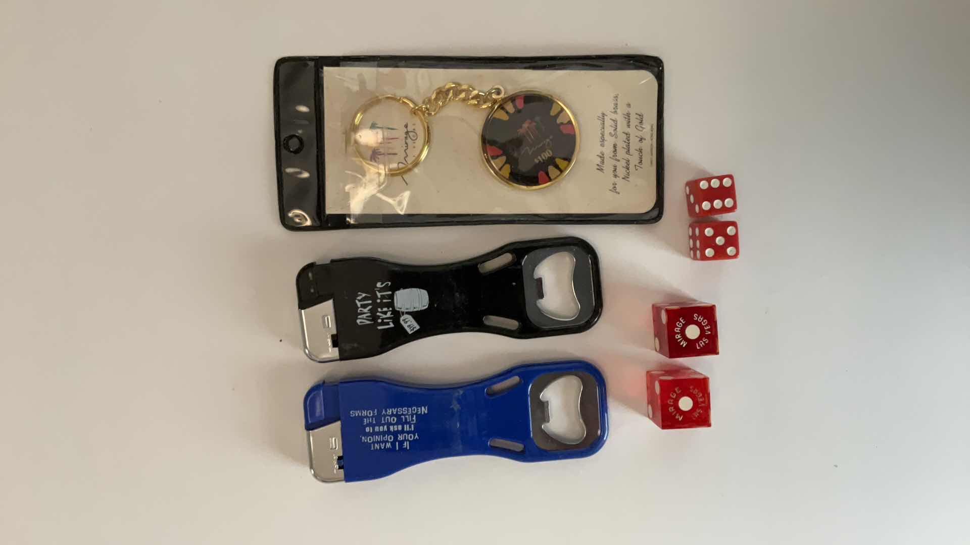 Photo 1 of LAS VEGAS KEYCHAIN AND DICE, BOTTLE OPENER/LIGHTERS