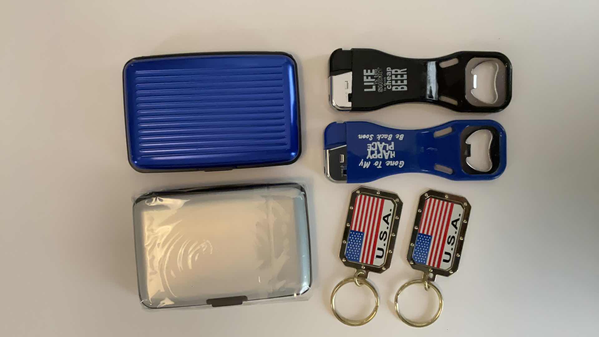 Photo 1 of CARDHOLDERS, KEYCHAINS AND LIGHTER/BOTTLE OPENERS