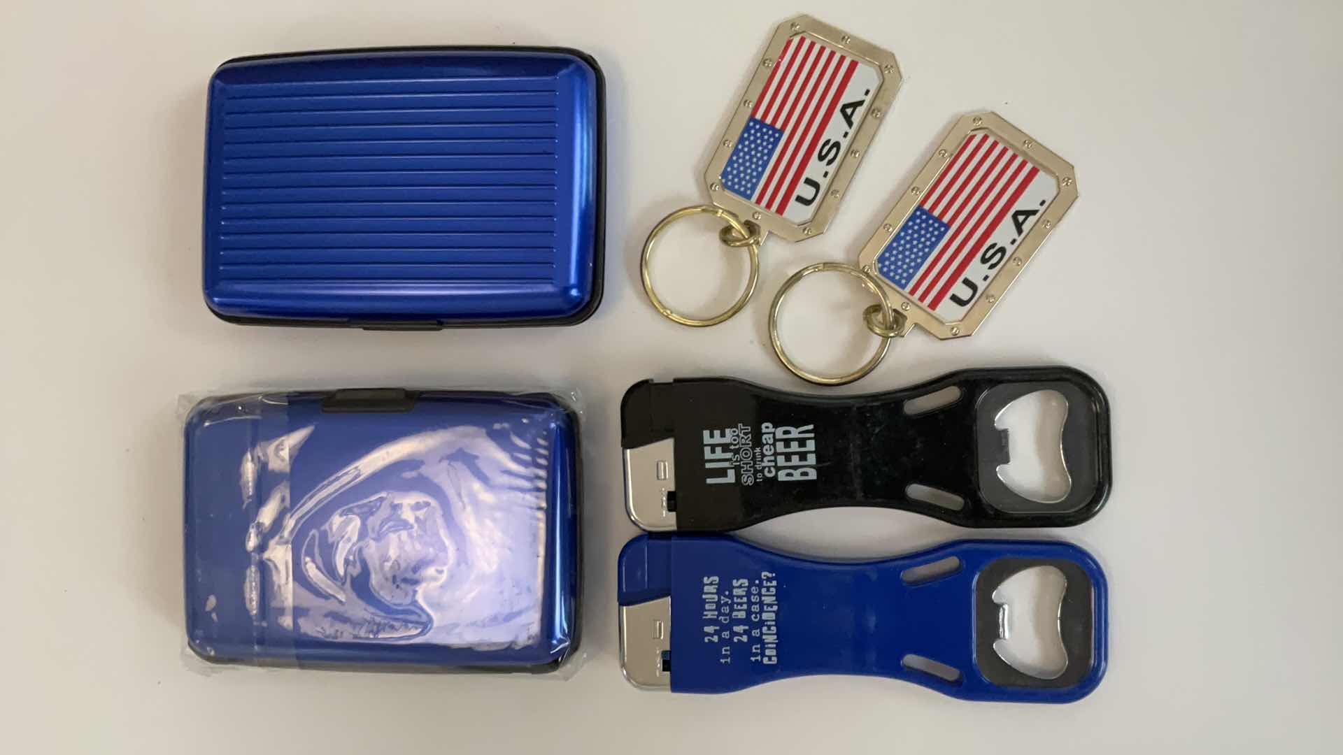 Photo 1 of CARDHOLDERS, KEYCHAINS AND LIGHTER/BOTTLE OPENERS