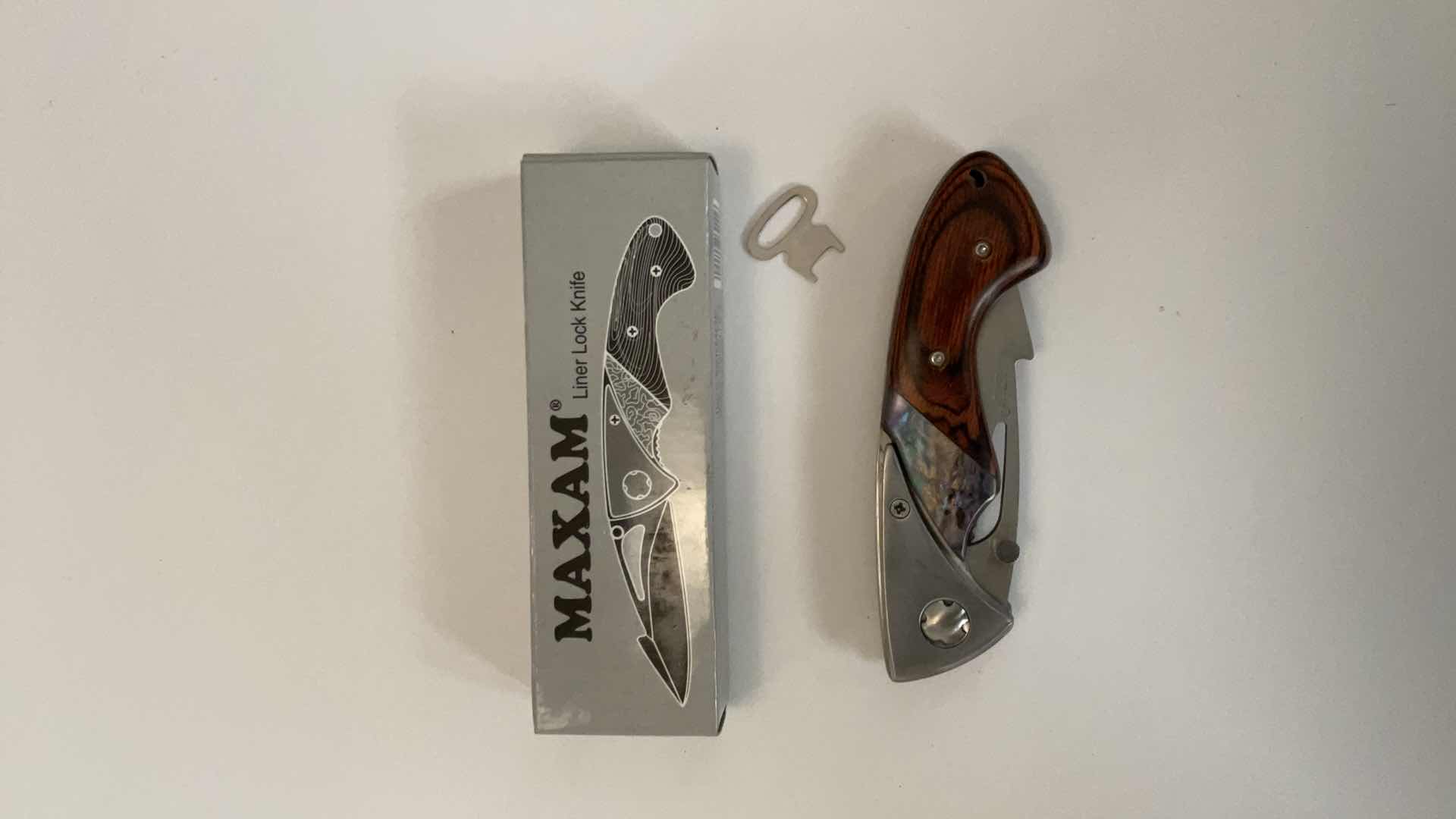 Photo 1 of 2 POCKET KNIVES AND HOLDER