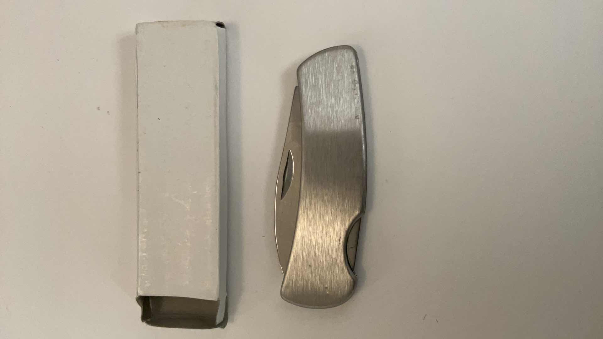 Photo 1 of 2 POCKET KNIVES AND HOLDER