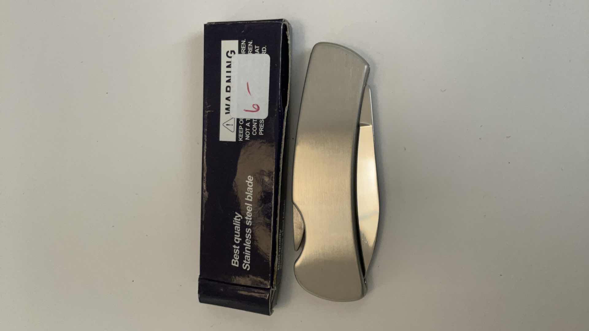 Photo 1 of 2 POCKET KNIVES AND HOLDER