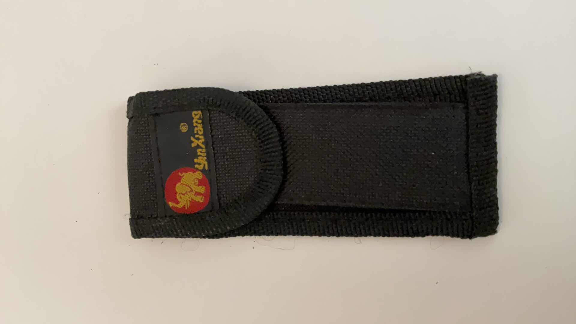 Photo 1 of 2 POCKET KNIVES AND HOLDER