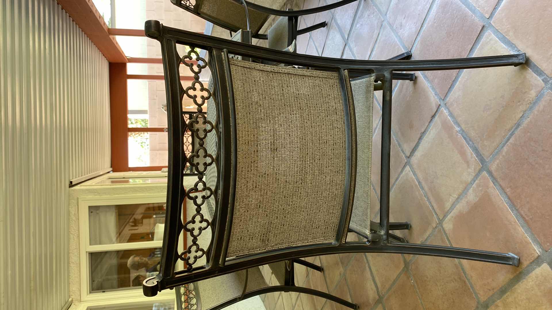 Photo 1 of ALUMINUM PATIO TABLE 67” X 38” H29” WITH 4 CHAIRS